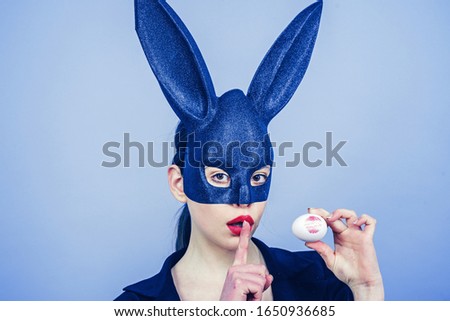 Egg hunt. Lipstick kiss print on easter egg. Bunny woman. Happy easter. Girl with lace bunny ears. Lips and Easter, Lipstick kiss imprint on easter egg