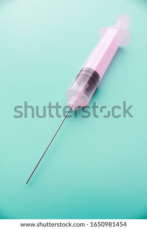 A syringe is a simple reciprocating pump consisting of a plunger that fits tightly within a cylindrical tube called a barrel.  sucking in and ejecting liquid in a thin stream. for vaccination. 