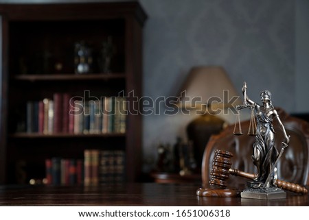 Judge's gavel, scales, statue of justice. Law concept. 