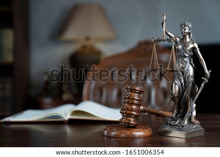 Judge's gavel, scales, statue of justice. Law concept. 