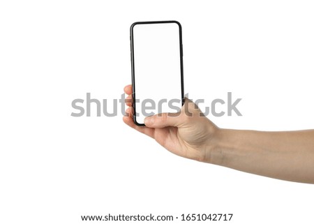Female hand holding phone with empty screen, isolated on white background
