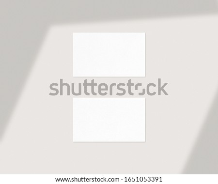 Blank white business cards mockups with shadow Overlay. Mockup scene. Photo mockup with clipping path.