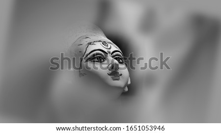 Goddess Durga Face in Happy Durga Puja Subh Navratri background Royalty-Free Stock Photo #1651053946