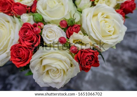 Roses flower arrangement, white and red roses, small cute flowers.