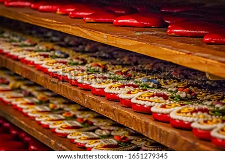 Rows of decorated gingerbread in Radovljica, one of the best preserved old town structures in Slovenia. Royalty-Free Stock Photo #1651279345