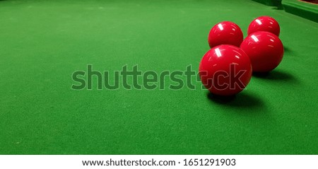 snooker balls on a green table