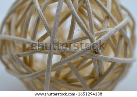 Closeup of a woven round object.