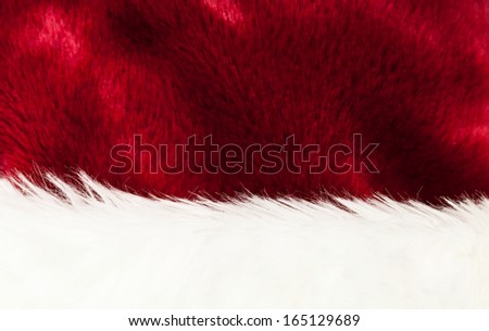 Detail Of Santa's Red and White Fur Hat Background Texture