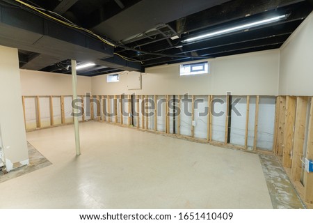 drywall has been removed after water damage and flooding Royalty-Free Stock Photo #1651410409