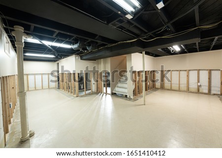 basement has been waterproofed and damaged drywall has been remo Royalty-Free Stock Photo #1651410412