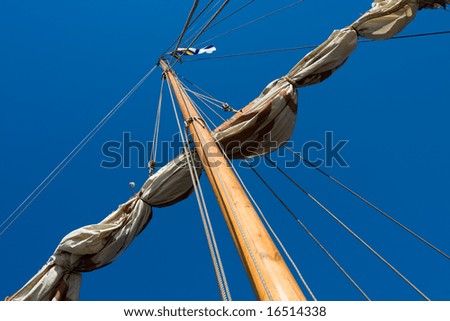 mast on blue sky background