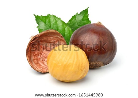 Close-up Chestnuts with peeled with green leaves isolated on white background. Royalty-Free Stock Photo #1651445980