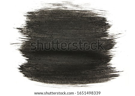 black charcoal brush stroke isolated on white background.