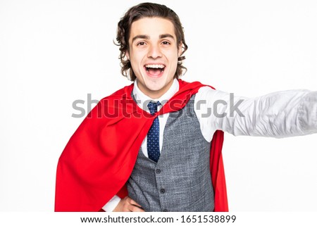 Young man superhero take selfie on white background