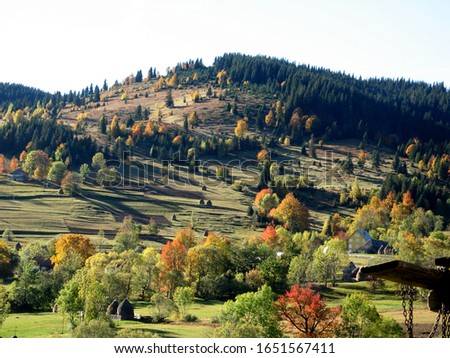 Serene Transylvanian hills in a sunny autumn day