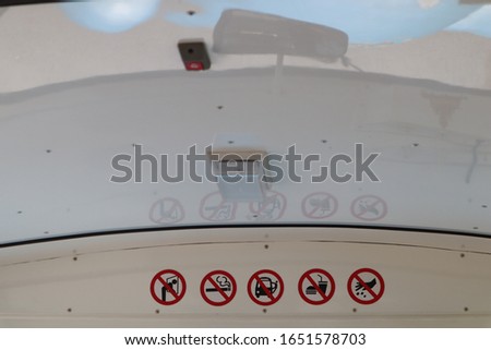 Various prohibition signs in the cars.