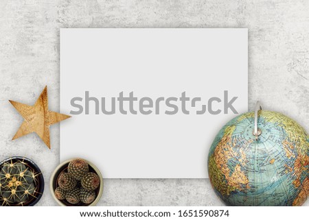 Top view flat lay World concept with concrete background and white empty canvas
