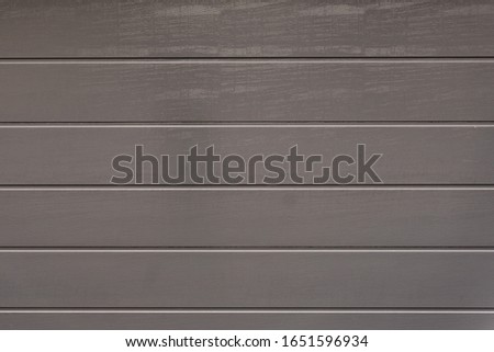 front of a grey garage door texture
