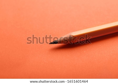 Ordinary pencil on color background