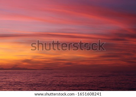 Pink sunset over the sea Sicily