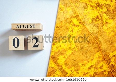 August 2, Empty white - Yellow leaf pattern background.