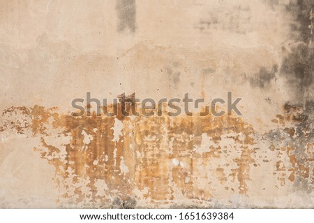 Close up of old dirty rough surface stone walll background Royalty-Free Stock Photo #1651639384