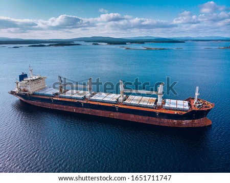 Large cargo ship in the White sea aerial view Royalty-Free Stock Photo #1651711747