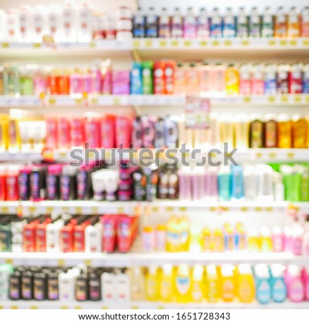 Front view, Abstract concept blurred colorful background, Shopping several consumer good on shelves in convenience supermarket and minimart (nobody)