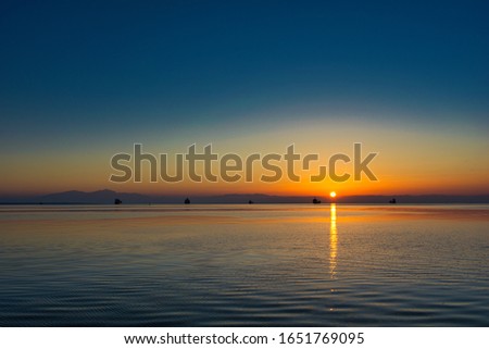 Beautiful sunset on Mediterranean coastline, Night skyline and sea sunset image