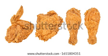 Fried chicken isolated on white background. Top view Royalty-Free Stock Photo #1651804351