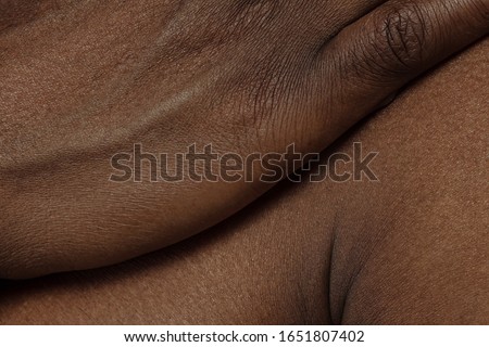 Hand. Detailed texture of human skin. Close up shot of young african-american male body. Skincare, bodycare, healthcare, hygiene and medicine concept. Looks beauty and well-kept. Dermatology. Royalty-Free Stock Photo #1651807402