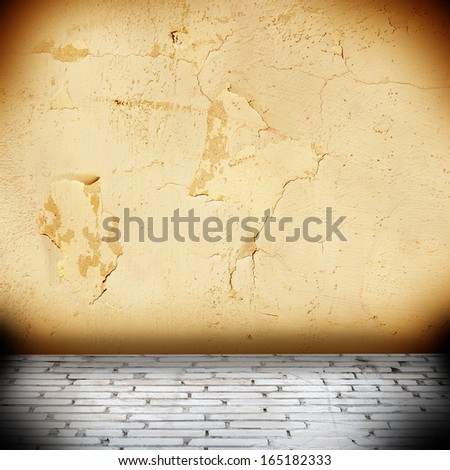 grunge background with concrete wall and brick floor