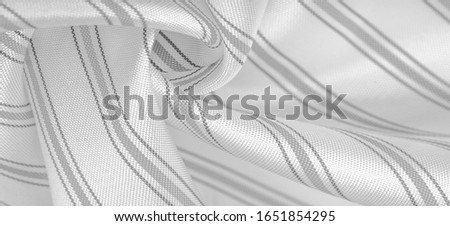 embossed drawing, composite textiles, dense silk fabric of white color, gray lines, stroke on fabric, narrow strip. feature, line, stroke, dash, trace,
