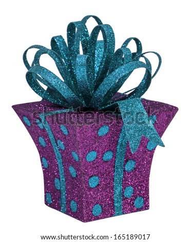 Purple with polka dots whimsical gift box with a blue glitter bow isolated on white