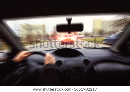 sudden braking in the car to avoid collision Royalty-Free Stock Photo #1651902217