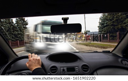 frontal collision of a car with a truck Royalty-Free Stock Photo #1651902220