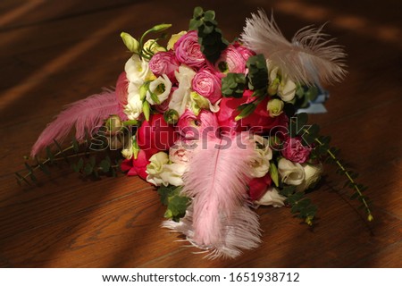 A wedding bouquet of roses.