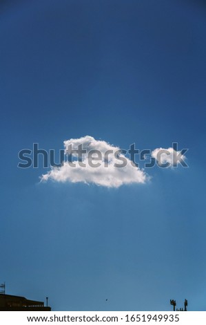 Magritte-like surreal cloud photographed in Naples. Royalty-Free Stock Photo #1651949935