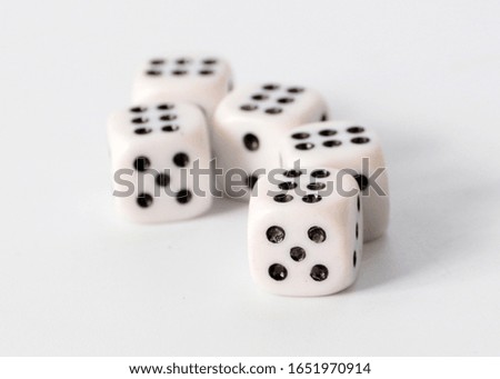 playing dice with winning combinations of numbers on the faces