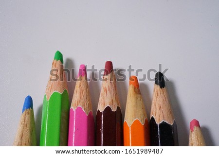 Many colour pencils on the white background. We can use t for drawing some great picture in the Art class in school. Kids are also need all of them.