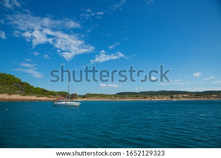 picture taken while sailing through the mediterranean sea. The island is Menorca in Spain