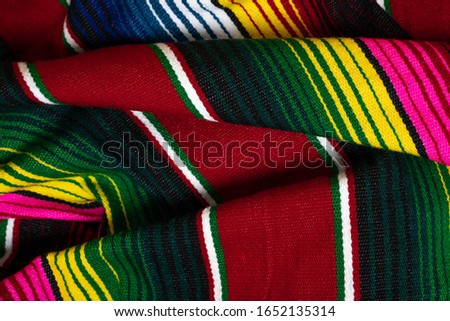 Colorful Mexican serape blanket creating a background