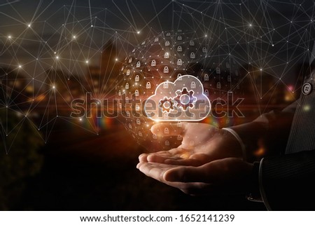 Information security concept. Hands support information clouds.