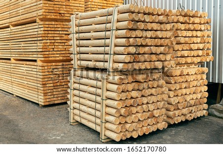 Lumber in stock. Wooden stakes. Ready for loading