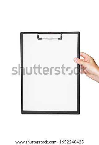 female hand holds a clipboard with white empty sheet of paper on a white isolated background. Mockup, copy space, template for text