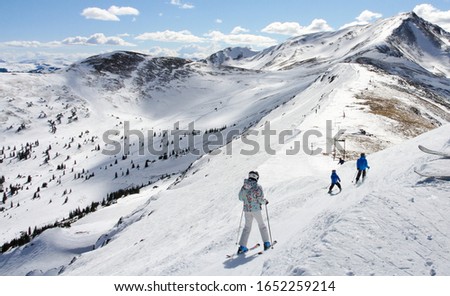 Family skiing in Summit County, Colorado Royalty-Free Stock Photo #1652259214