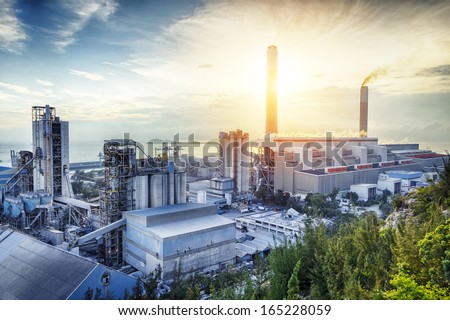 Glow light of petrochemical industry on sunset. Royalty-Free Stock Photo #165228059