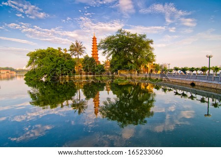 Tran Quoc pagoda in early morning in Hanoi, Vietnam Royalty-Free Stock Photo #165233060