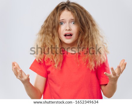 Red shirt emotional woman curly hair emotions
