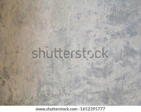 The​ pattern​ of​ surface​ wall​ concrete​ for​ white​ background. Rough​ wall​ texture​ use​ for​ paper​ background. Wall​ concrete isolated​ colors.